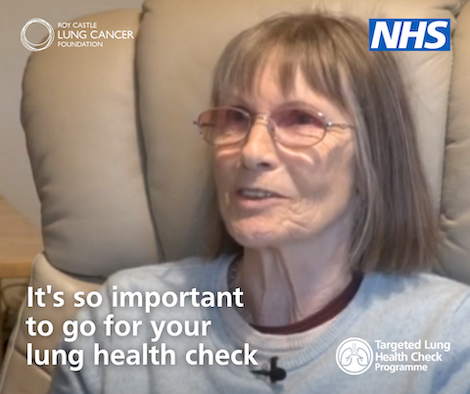A woman wearing glasses is sat on her sofa. The text says 'It's so important to go for your lung health check'.
