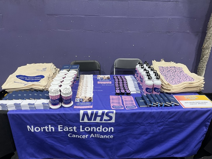 stall set up with NELCA HPV Vaccine merch 
