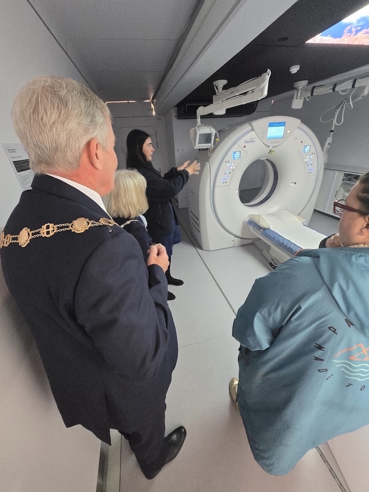 The Mayor and Mayoress of Havering look at the CT scan machine inside the lung truck