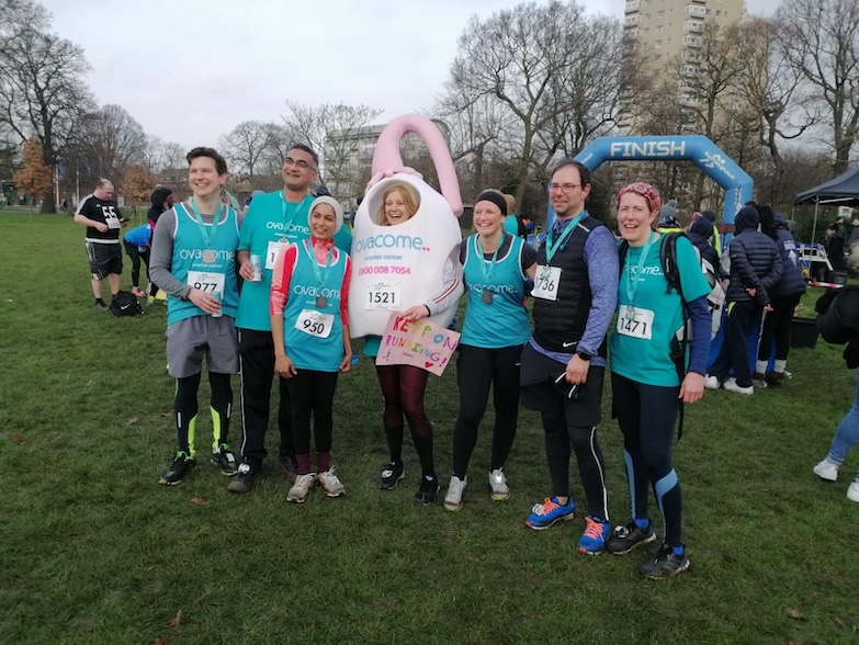 A team is pictured in a park getting ready to take part in a charity run.