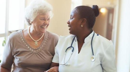 Patient and doctor walking
