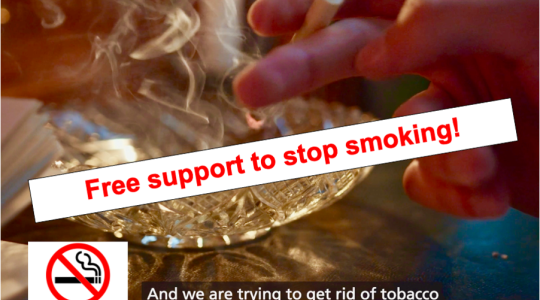 The image is of a cigarette burning above an ash tray. The words 'free support to stop smoking' appear in red font in a white box across the centre. To the bottom left is the no smoking sign.