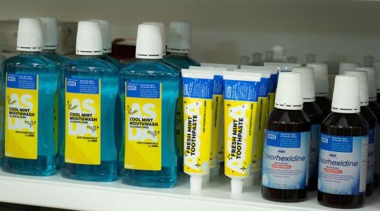 The images shows Asda branded bottles of mouthwash and toothpaste on a shelf