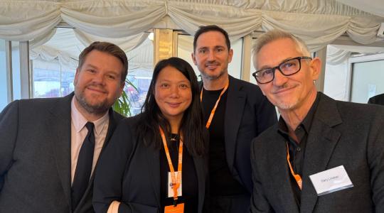Angela Wong is pictured with James Corden, Frank Lampard and Gary Lineker