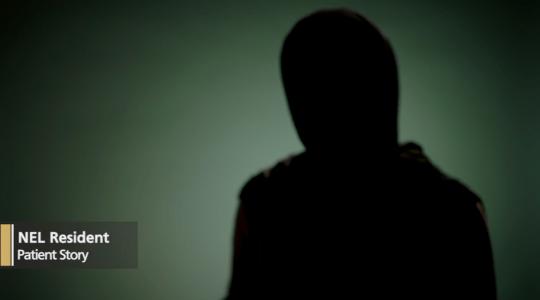 A person is hidden by a shadow to protect their identity. The caption says NEL Resident Patient Story.