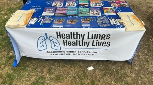 table with a range of informative flyers and leaflets around cancer