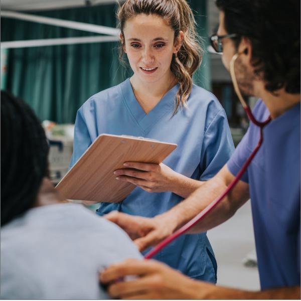 Doctors examining patient