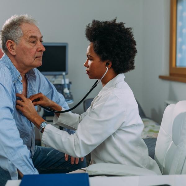 Doctor using a stethoscope