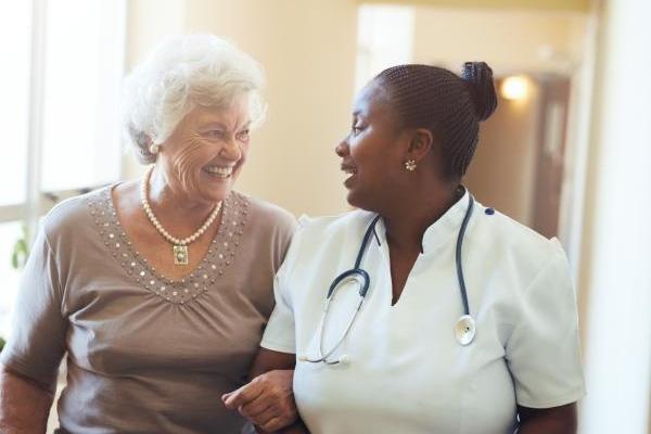 Patient and doctor walking