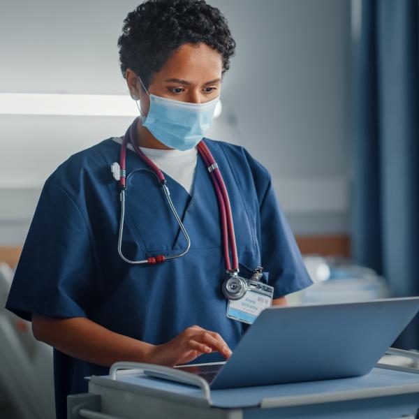 nurse on a laptop