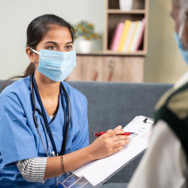 nurse showing doctor information